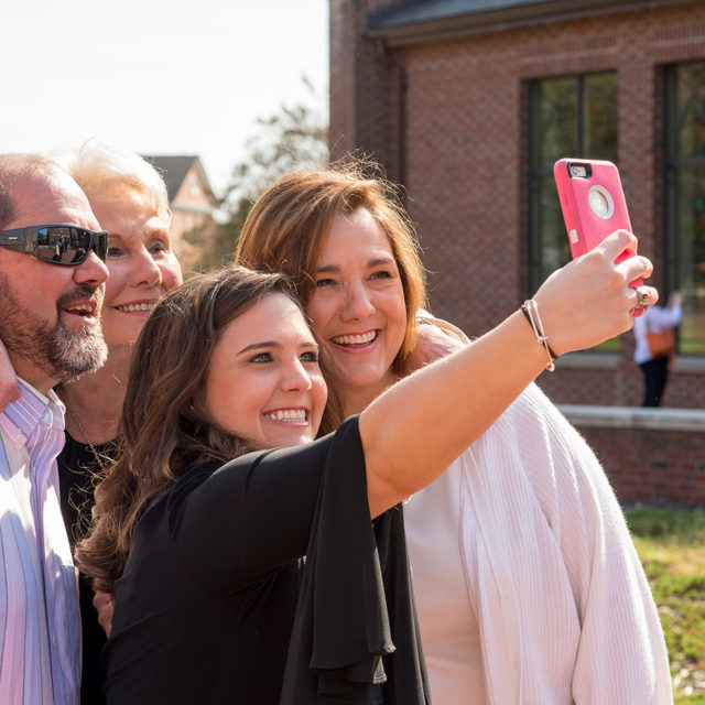 image of family with Campbell University student