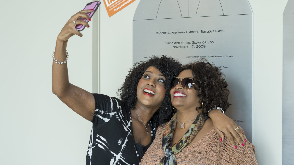 students take photo for tag day