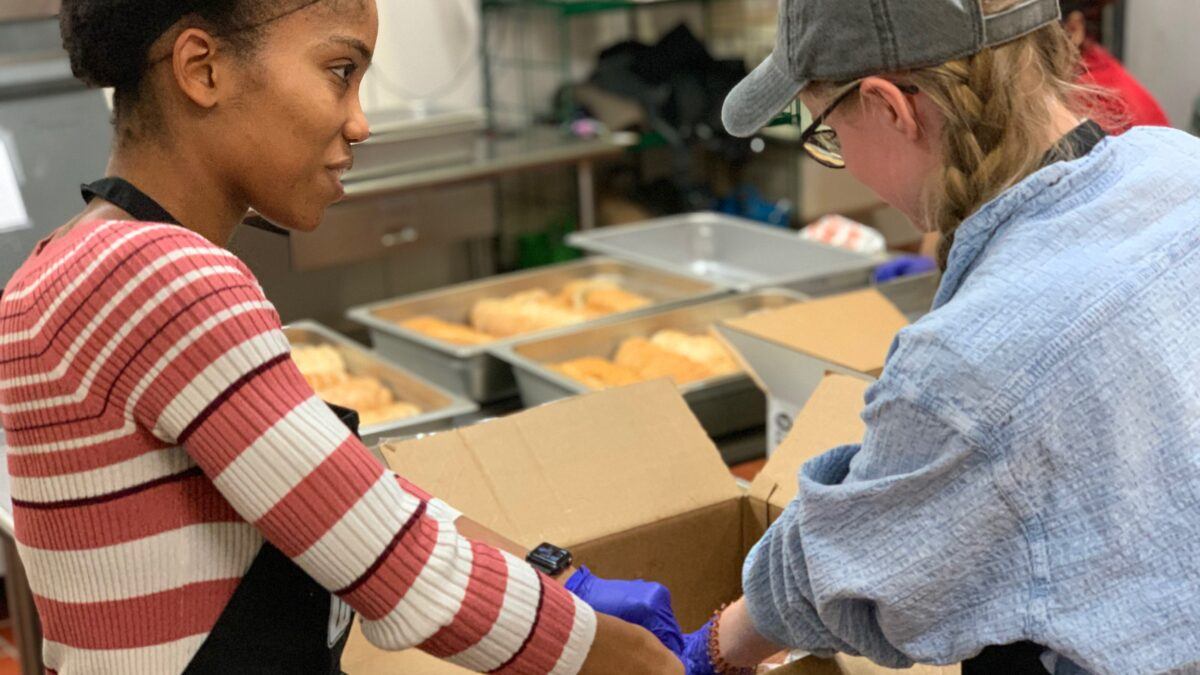 packing boxes to distribute to the community